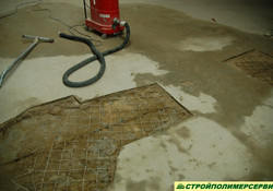 Бракованные псевдоупрочненные бетонные полы подготовлены к ремонту.